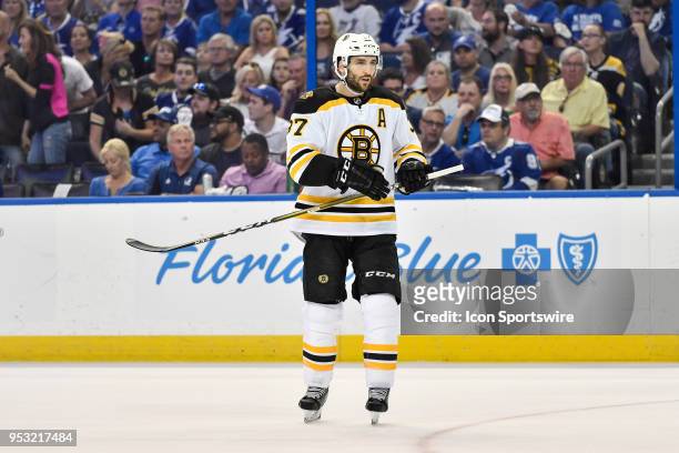 Boston Bruins center Patrice Bergeron during the first period of an NHL Stanley Cup Eastern Conference Playoffs game between the Boston Bruins and...