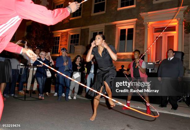 Tiffany Haddish jumps roap during the afterparty at the For Your Consideration Red Carpet Event for TBS' Hipsters and O.G.'s at Steven J. Ross...