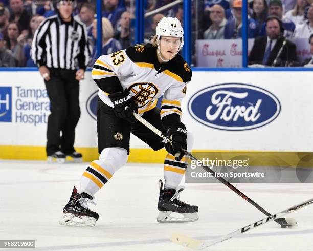 Boston Bruins center Danton Heinen looks for options during the third period of an NHL Stanley Cup Eastern Conference Playoffs game between the...