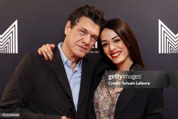 Actor Marc Lavoine and actress Sofia Essaidi attend Series Mania Lille Hauts de France festival day 4 photocall on April 30, 2018 in Lille, France.