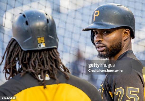 Pittsburgh Pirates right fielder Gregory Polanco talking to first baseman Josh Bell before a MLB game between the Washington Nationals and the...