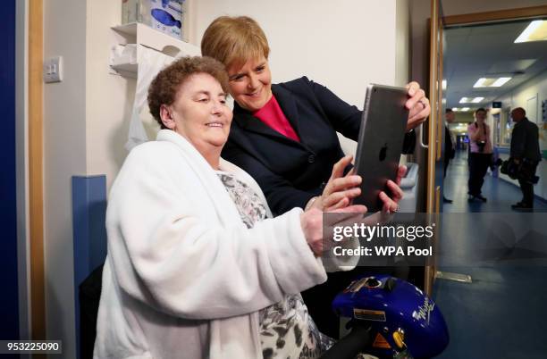 First Minister Nicola Sturgeon meets patient Patricia Pearson, from Dunfermline, during a visit to the Edinburgh Royal Infirmary on April 30, 2018 in...