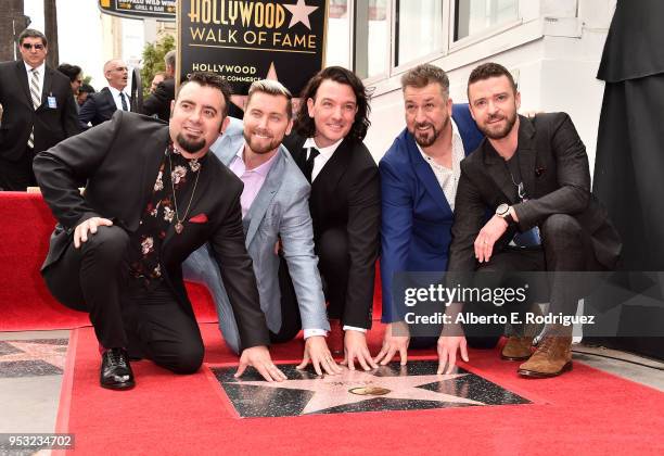 Singers Chris Kirkpatrick, Lance Bass, JC Chasez, Joey Fatone and Justin Timberlake of NSYNC are honored with a star on the Hollywood Walk of Fame on...