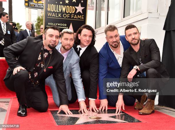Singers Chris Kirkpatrick, Lance Bass, JC Chasez, Joey Fatone and Justin Timberlake of NSYNC are honored with a star on the Hollywood Walk of Fame on...