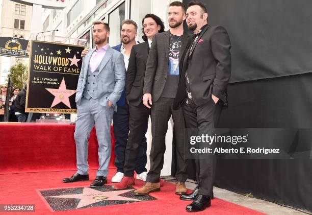 Singers Chris Kirkpatrick, Lance Bass, JC Chasez, Joey Fatone and Justin Timberlake of NSYNC are honored with a star on the Hollywood Walk of Fame on...