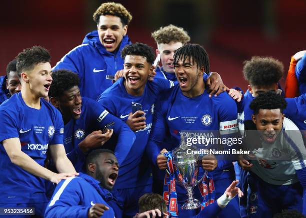 Reece James of Chelsea FC holds the trophy as his team celebrate winning the FA Youth Cup Final, second leg match between Arsenal and Chelsea at...