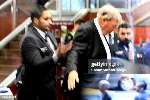 Cardinal George Pell is searched by security guards on arrival at Melbourne Magistrates' Court on May 1, 2018 in Melbourne, Australia. Cardinal Pell...