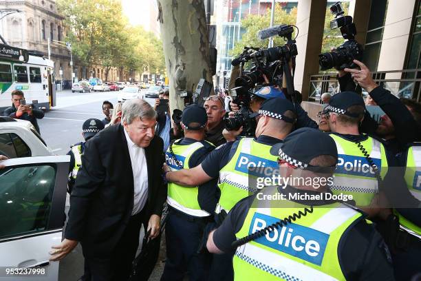 Cardinal George Pell arrives at Melbourne Magistrates' Court on May 1, 2018 in Melbourne, Australia. Cardinal Pell was charged on summons by Victoria...