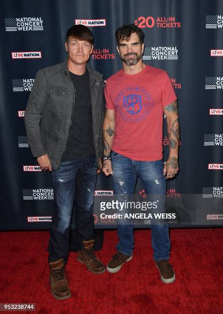 Brad Arnold and of Chris Henderson of 3 Doors Down attend Live Nation's celebration of the 4th annual National Concert Week at Live Nation on April...