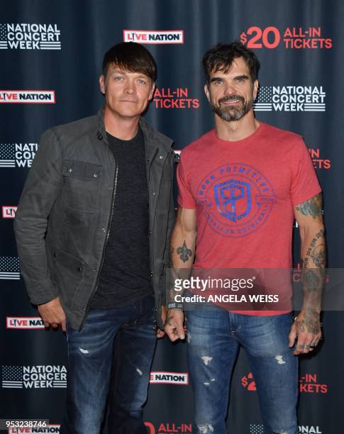 Brad Arnold and of Chris Henderson of 3 Doors Down attend Live Nation's celebration of the 4th annual National Concert Week at Live Nation on April...