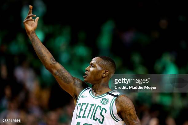 Terry Rozier of the Boston Celtics celebrates after hitting a three point shot against the Philadelphia 76ers during the first quarter of Game One of...