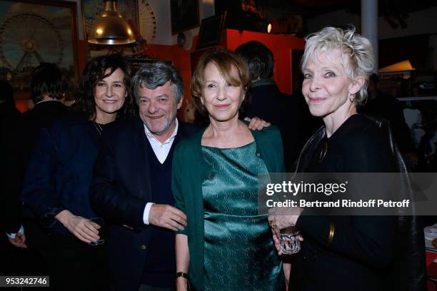Valerie Lemercier, Jean-Louis Borloo, Nathalie Baye and Tonie Marshall attend the Dinner in honor of Nathalie Baye at La Chope des Puces on April 30,...