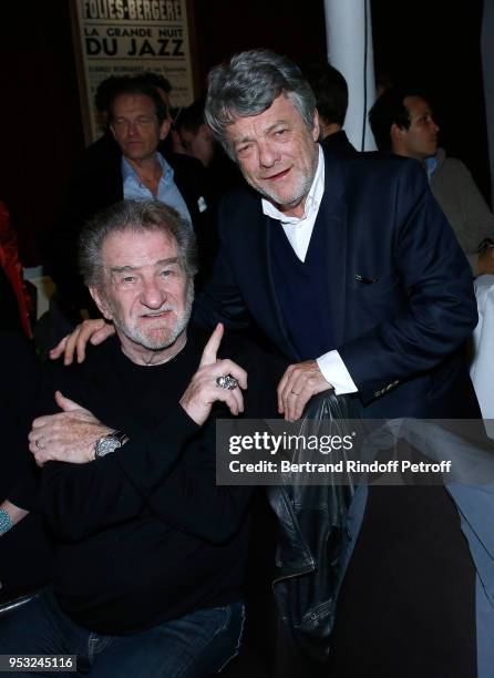 Eddy Mitchell and Jean-Louis Borloo attend the Dinner in honor of Nathalie Baye at La Chope des Puces on April 30, 2018 in Saint-Ouen, France.