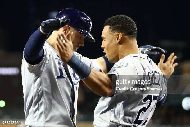 Cron of the Tampa Bay Rays celebrates his ninth inning two run home run with Carlos Gomez while playing the Detroit Tigers at Comerica Park on April...