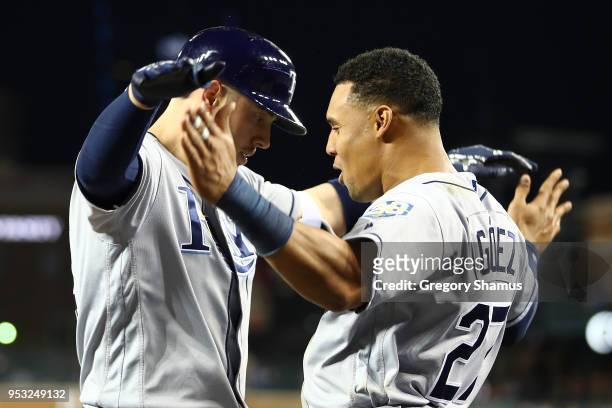 Cron of the Tampa Bay Rays celebrates his ninth inning two run home run with Carlos Gomez while playing the Detroit Tigers at Comerica Park on April...