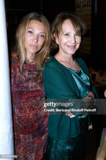 Laura Smet and her mother Nathalie Baye attend the Dinner in honor of Nathalie Baye at La Chope des Puces on April 30, 2018 in Saint-Ouen, France.