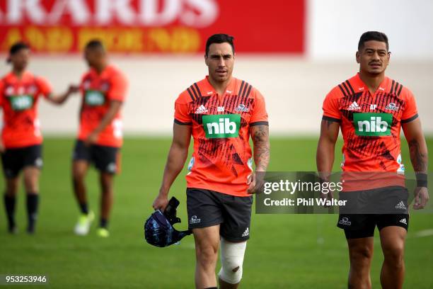 Daniel Kirkpatrick and Augustine Pulu arrive for a Blues Super Rugby training session at Alexandra Park on May 1, 2018 in Auckland, New Zealand.