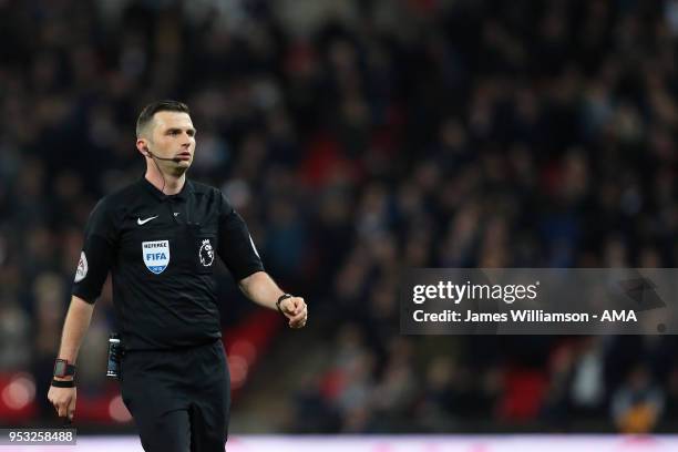 Match referee Michael Oliver during the Premier League match between Tottenham Hotspur and Watford at Wembley Stadium on April 30, 2018 in London,...