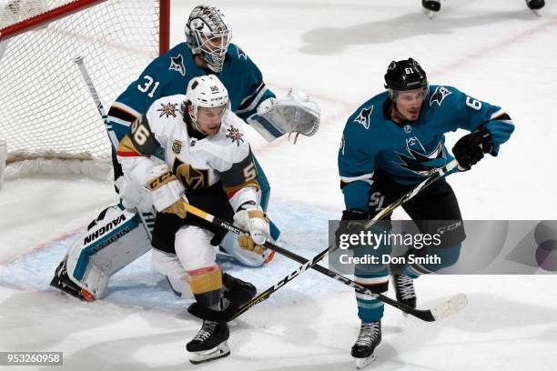 Martin Jones and Justin Braun of the San Jose Sharks protect the net against Erik Haula of the Vegas Golden Knights in Game Three of the Western...