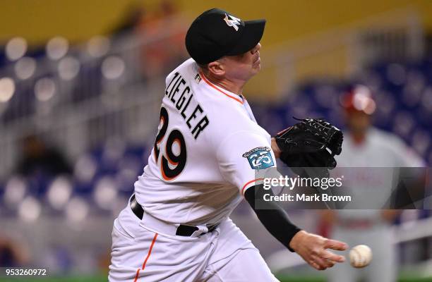 Brad Ziegler of the Miami Marlins pitches in the ninth inning against the Philadelphia Phillies at Marlins Park on April 30, 2018 in Miami, Florida.