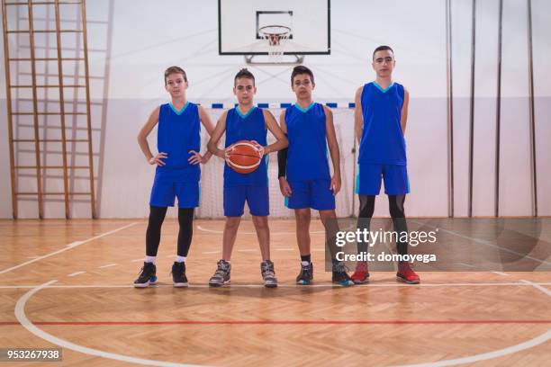 team of young basketball players - basketball league stock pictures, royalty-free photos & images