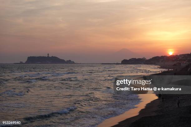 the evening sun on mt. fuji, sagami bay, enoshima island in fujisawa city in japan - enoshima island stock pictures, royalty-free photos & images