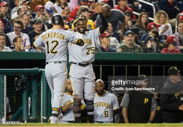 Home run hitter Pittsburgh Pirates left fielder Corey Dickerson greeted by right fielder Gregory Polanco on the dugout steps during a MLB game...