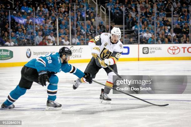 Melker Karlsson of the San Jose Sharks tries to block a pass by Nate Schmidt of the Vegas Golden Knights in Game Three of the Western Conference...