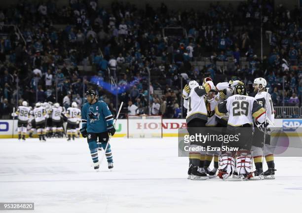 Marc-Andre Fleury of the Vegas Golden Knights is congratulated by teammates after they beat Joe Pavelski and the San Jose Sharks in Game Three of the...