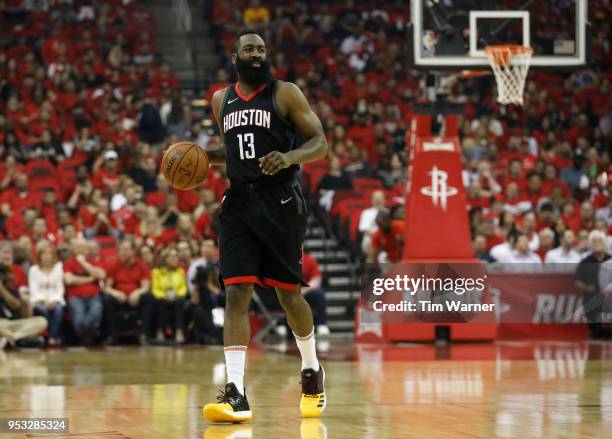 James Harden of the Houston Rockets brings the ball down the court in the first half during Game Five of the first round of the 2018 NBA Playoffs...