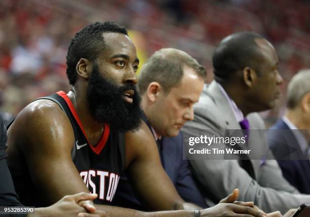 James Harden of the Houston Rockets rests on the bench in the first half during Game Five of the first round of the 2018 NBA Playoffs against the...