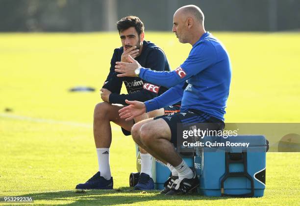 Rhys Williams of the Victory speaks to Kevin Muscat the coach of the Victory during a Melbourne Victory A-League training session at Gosch's Paddock...