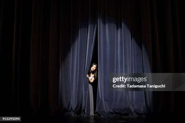 pianist looking at audience - theatre curtains stock pictures, royalty-free photos & images