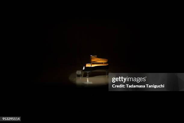 grand piano at concert hall - music venue stock pictures, royalty-free photos & images