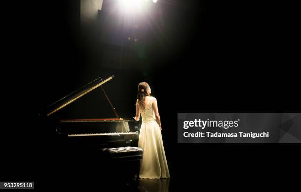 pianist at the stage - concerto classico foto e immagini stock