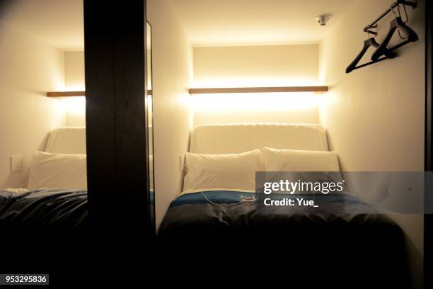 japanese capsule hotel - small bedroom stock pictures, royalty-free photos & images