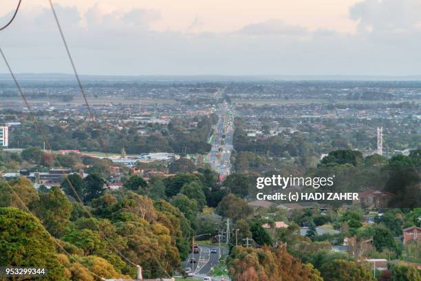 orange sunset over suburban melbourne | australia - dandenong stock pictures, royalty-free photos & images