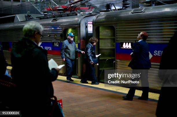 Conductor stands on the balcony of a Silverliner IV Regional Rail train, in Philadelphia, PA, on April 16, 2018. Southeastern Pennsylvania...