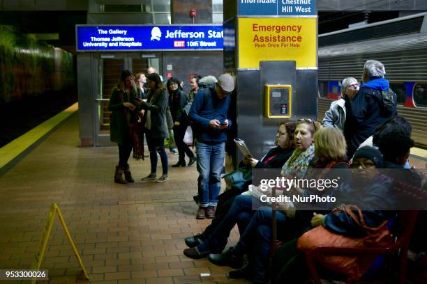 Passengers wait for the train on a platform of SEPTA's Jefferson Station in Center City Philadelphia, PA, on April 21, 2018. Southeastern...