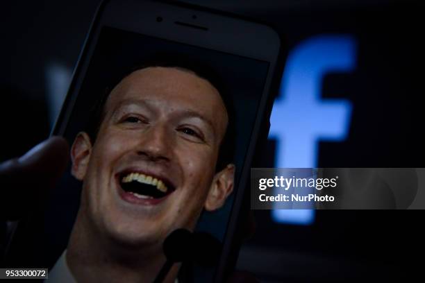 Pixelated photo of Facebook founder and CEO Mark Zuckerberg on an iPhone in this photo illustration on April 30, 2018.