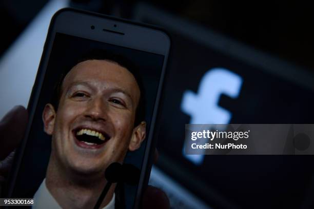 Pixelated photo of Facebook founder and CEO Mark Zuckerberg on an iPhone in this photo illustration on April 30, 2018.