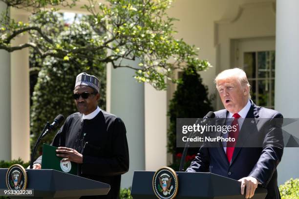 President Donald Trump , and President Muhammadu Buhari of the Federal Republic of Nigeria hold a joint press conference in the Rose Garden of the...