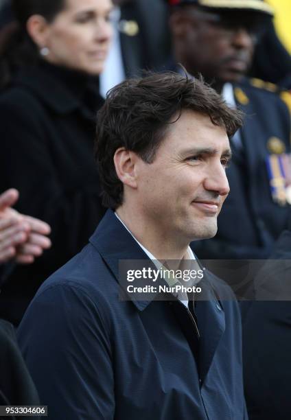 Canadian Prime Minister Justin Trudeau attends an inter-faith vigil at Nathan Phillips Square in memory of the 10 people killed and 15 people injured...