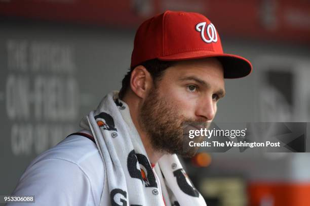 Washington Nationals second baseman Daniel Murphy watches the team play the Pittsburgh Pirates from the dugout at Nationals Park July 17, 2016 in...