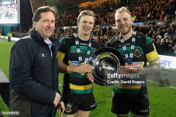 Tom Stephenson and Ben Nutley the Northampton Wanderers receive the trophy from Premiership Rugby CEO Mark McCafferty after their victory during the...