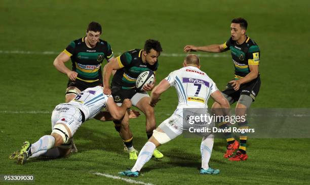 Tom Collins of Northampton is tackled during the Aviva A League Final between Northampton Wanderers and Exeter Braves at Franklin's Gardens on April...