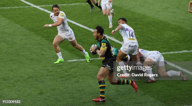 Nafi Tuitavake of Northampton breaks with the ball during the Aviva A League Final between Northampton Wanderers and Exeter Braves at Franklin's...