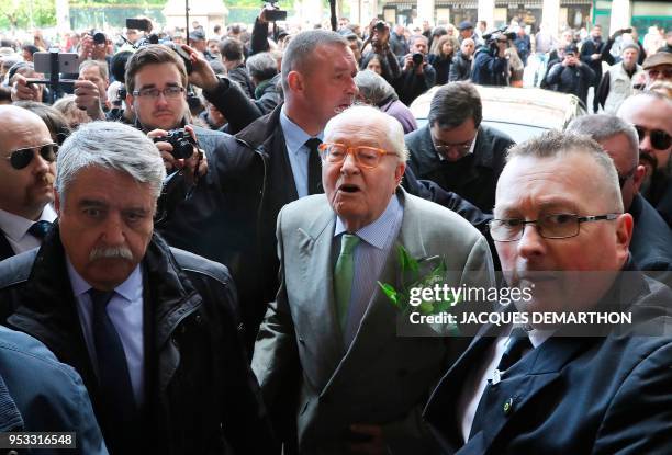 France's far-right Front National party founder and former leader Jean-Marie Le Pen arrives at the Place des Pyramides in Paris to attend a rally in...