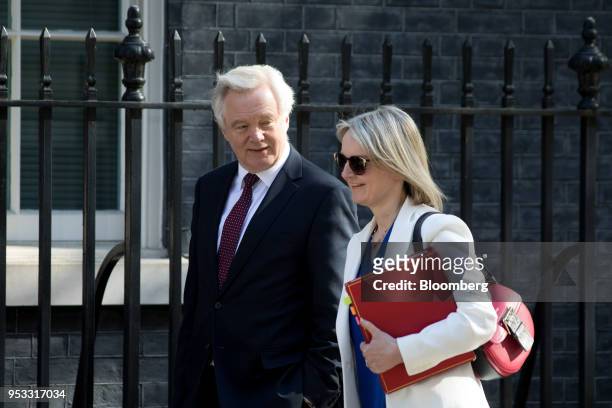 David Davis, U.K. Exiting the European Union secretary, left, and Liz Truss, U.K. Chief secretary to the treasury, arrive for a weekly meeting of...