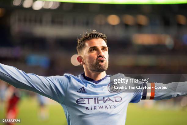 April 29: David Villa of New York City celebrates after scoring his second goal of the game in which he reached the milestone of scoring his 400th...